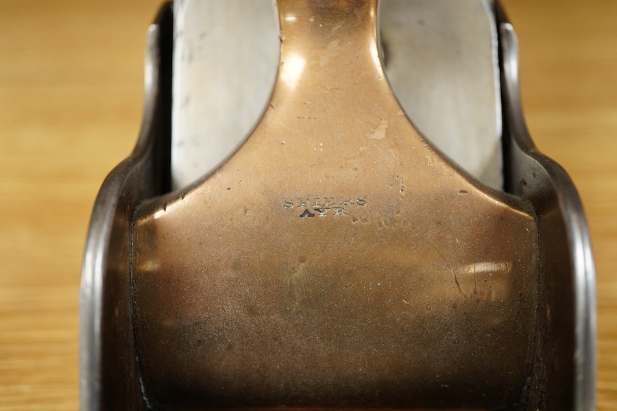 A Spiers dovetailed 14 1/2” panel plane, stamped with Spiers, Ayr to the brass lever cap and fitted with a Sorby iron, with rosewood infill